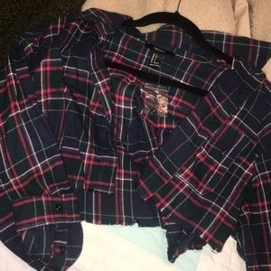 Cropped flannel never worn I did remove the tag.